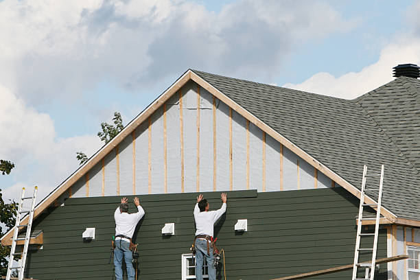 Professional Siding technician working in Lilburn, GA
